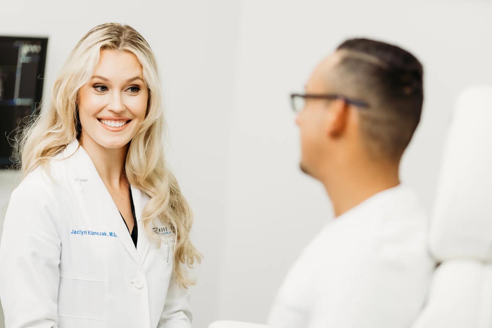 Dr Hancock and Dr Klimczak and Team Discussing Facial Volume Loss Treatment Options