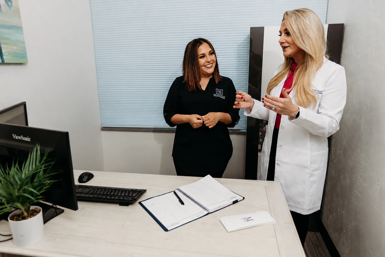 Dr. Hancock and the FSIBR team and Team Discussing Facial Volume Loss Treatment Options